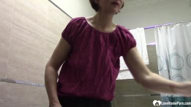 Ugly and hairy woman rubs herself in the bathroom