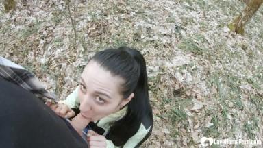 Amateur brunette girl sucking a dick outdoors