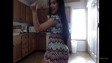 Brunette dancing in tight skirt