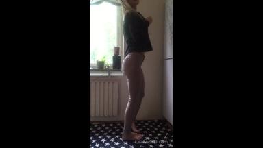 teen in tight jeans undressing herself