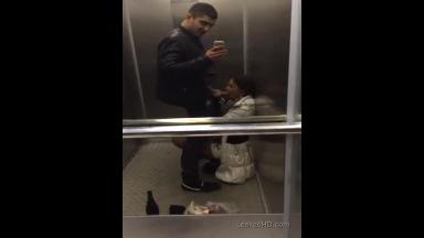 new girl in the office sucks off co-worker in the elevator