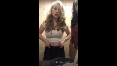 blonde teen bouncing her titties in a tight top