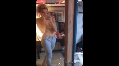 pretty teen taking of her tight jeans