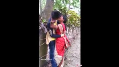 Indian Young lover Couple kissing in park