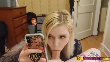 Girl plays with her phone while giving blowjob and fucking