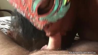 Masked black chick sucks a white dick POV