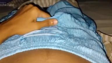 Young Asian girl records herself masturbating her hairy pussy