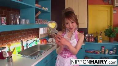 Japanese cutie maid gives a blowjob in the kitchen