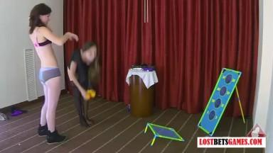 LOSTBETSGAMES - Two brunettes play a game of strip toss