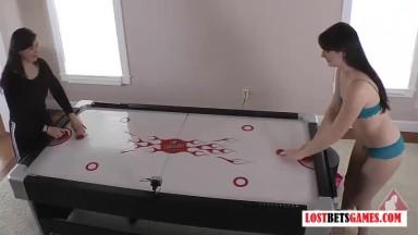 LOSTBETSGAMES - Two sexy girls play a game of strip air hockey