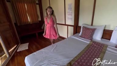 Stepfather and stepdaughter share a bed in a hotel room