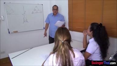 Thai student fucks her much older teacher in class in front of her friend