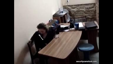 Lusty chick rubbing cunt on her office table