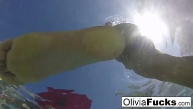 Olivia Austin has some summer fun in the pool