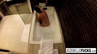 Jezebelle Bond films herself taking a bath