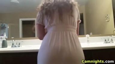 busty babe loves to ride dildo in the bathroom